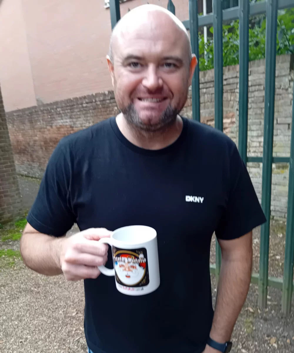 Danny Posthill with Santa Radio mug