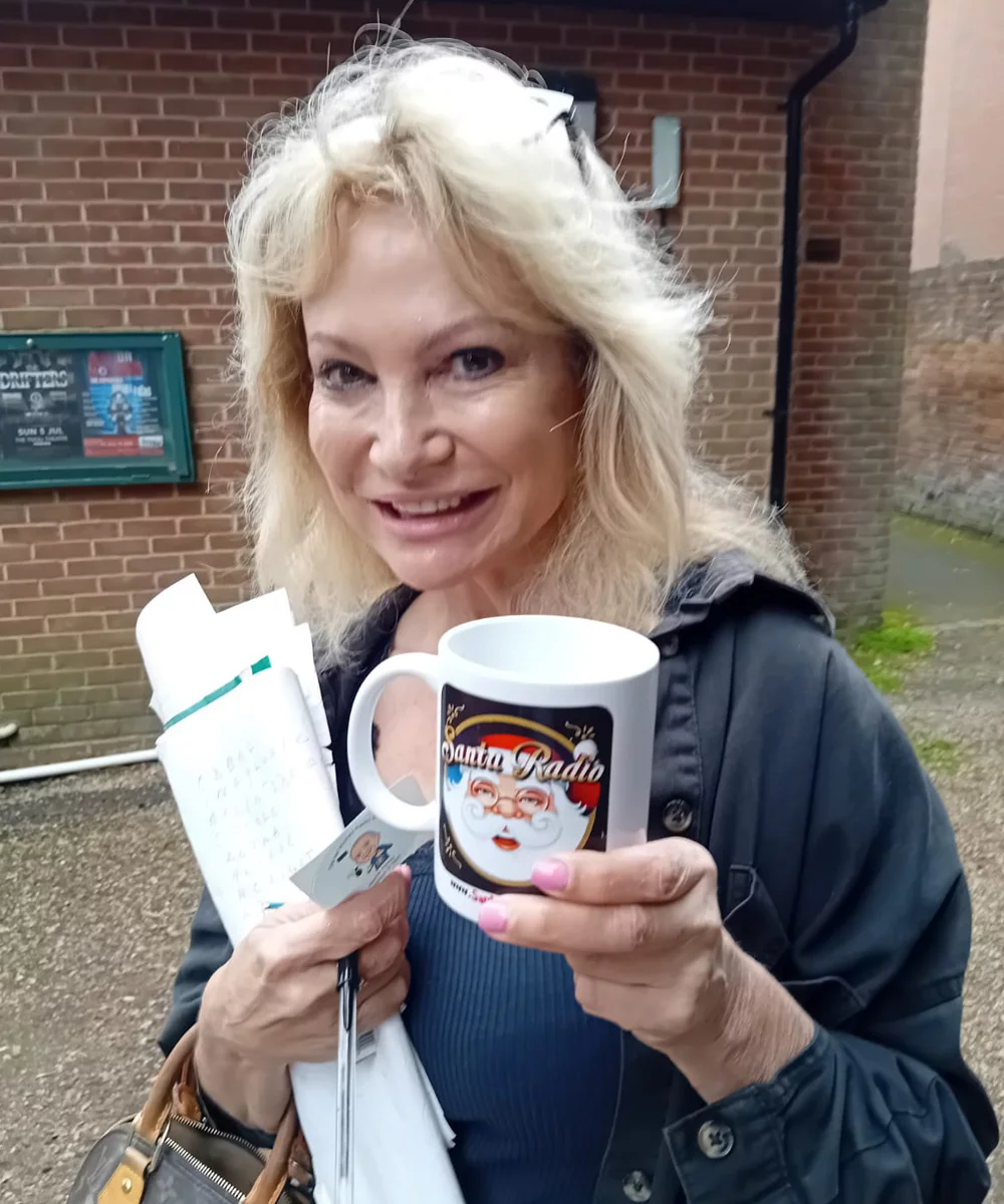 Debbie Arnold with Santa Radio mug