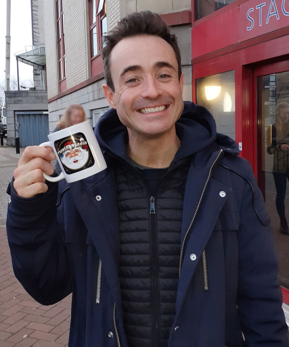 Joe McFadden with Santa Radio mug