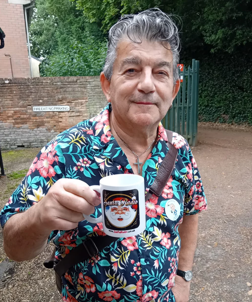 John Altman with Santa Radio mug