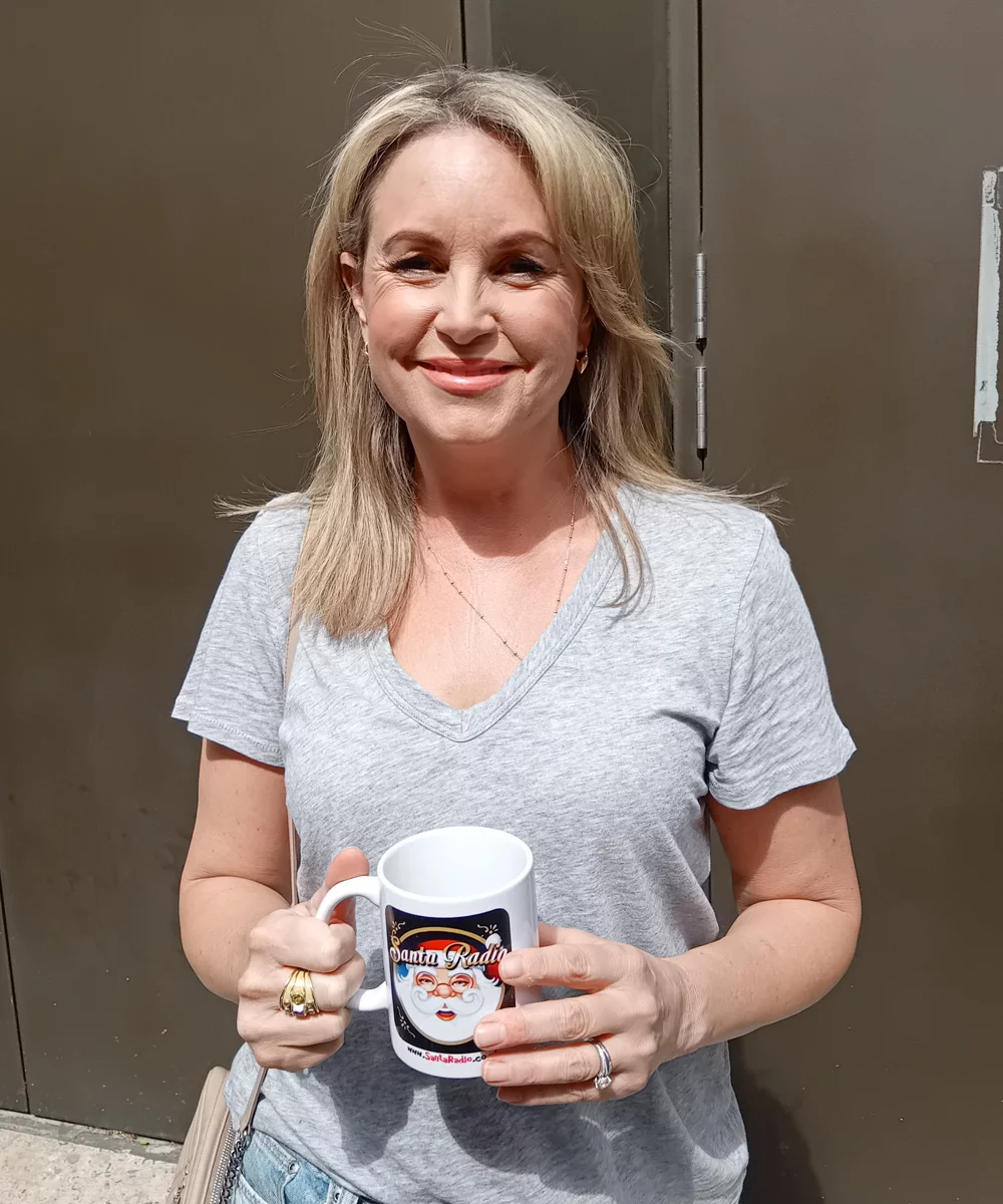 Kim Medcalf with Santa Radio mug